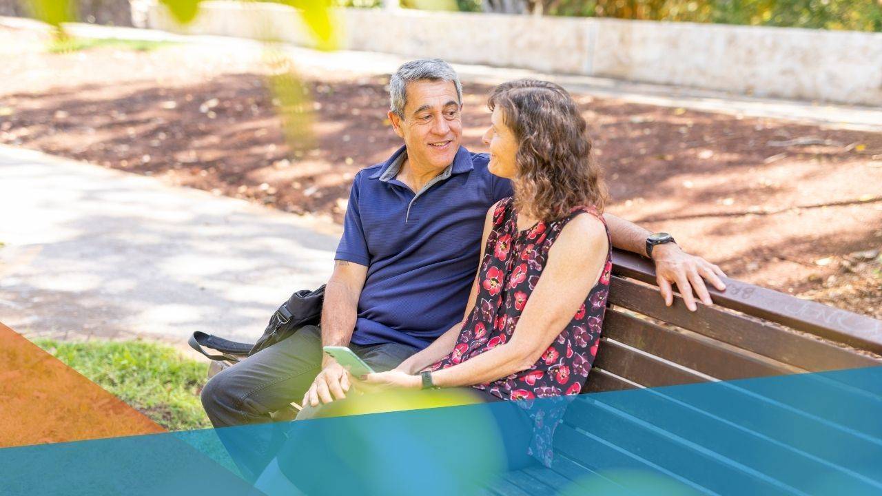 Middle Age Married Couple on a park bench