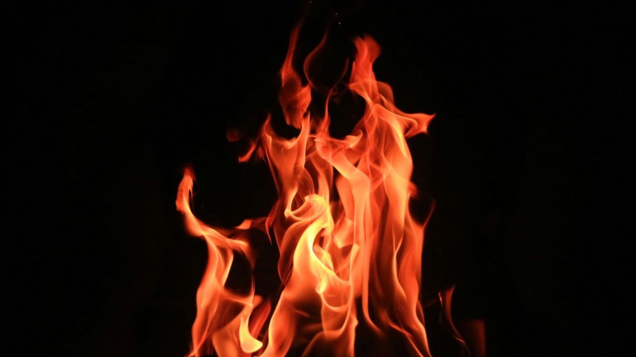 Flames on a black background - by Cullan Smith on Unsplash
