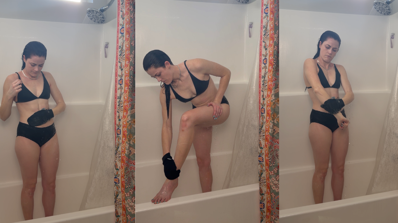 Woman exfoliating her skin with an exfoliating mitt before an at-home spray tan to prevent streaks and uneven fading.