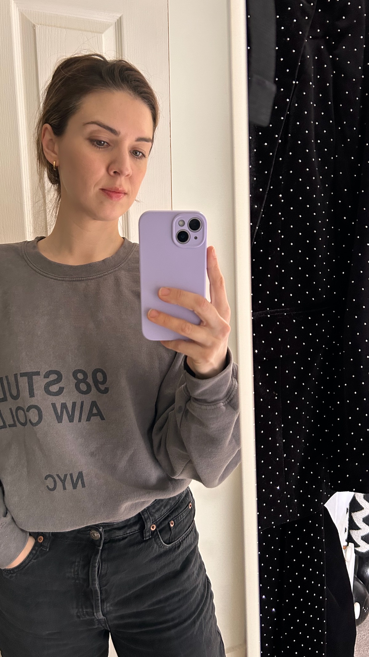 Amy Lord taking a mirror selfie, an introvert's take on visibility