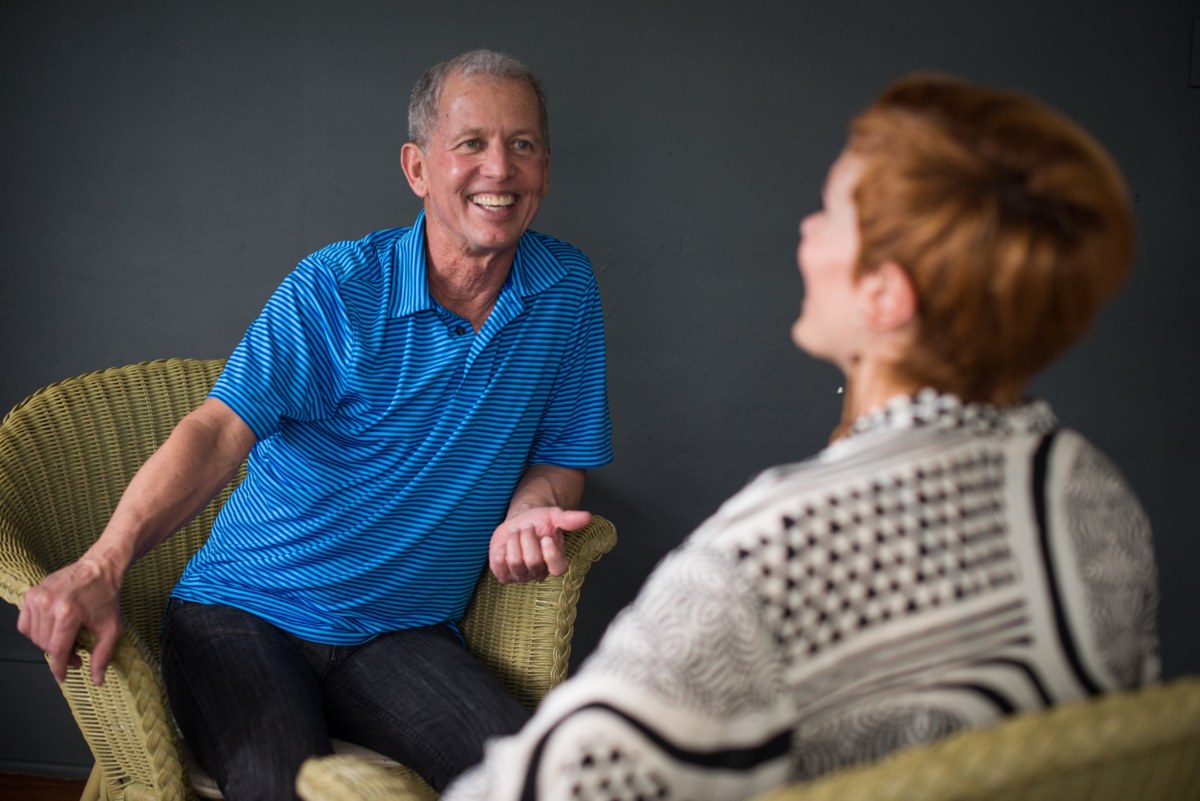 Roberto in conversation with a client during a private session