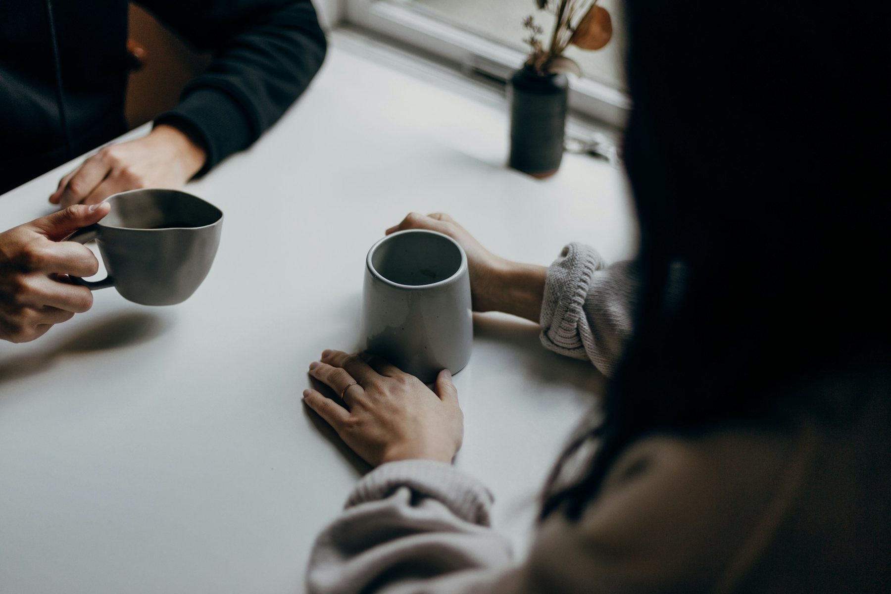 Two people sharing coffee