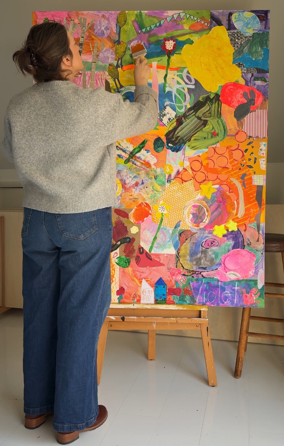 Shana Blakley founder of Heirloom Collage in her studio
