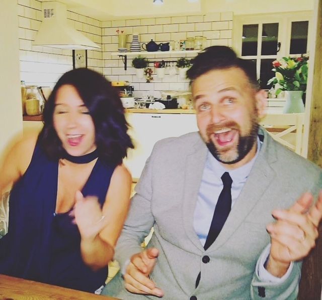 Trisha and Alex dancing in the kitchen.
