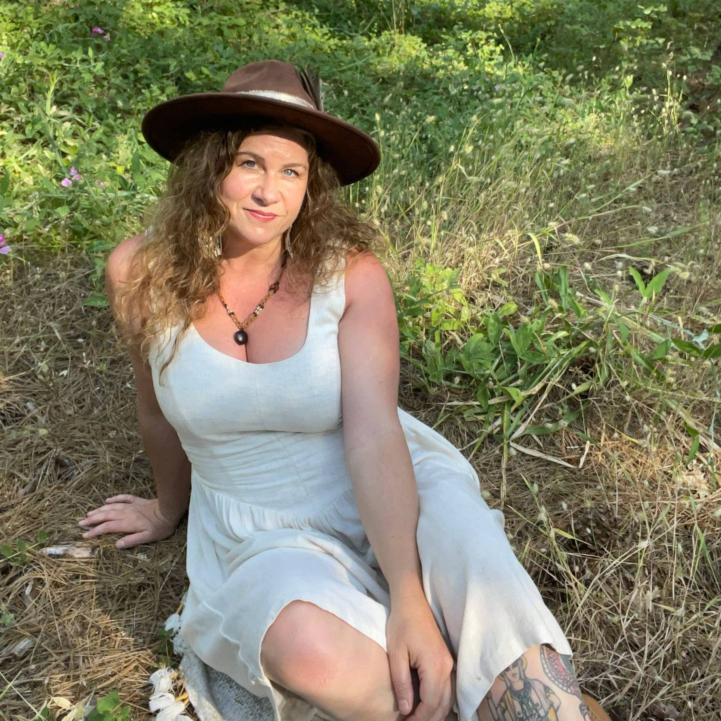 Portrait of Angela Sunshine Rose, founder of Sol Bodyworks and practitioner of Myofascial Release Therapy and Presence-Centered Awareness Therapy.