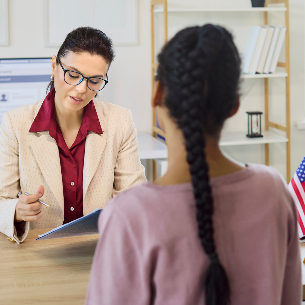 Woman undergoing a US Naturalization Interview and Test