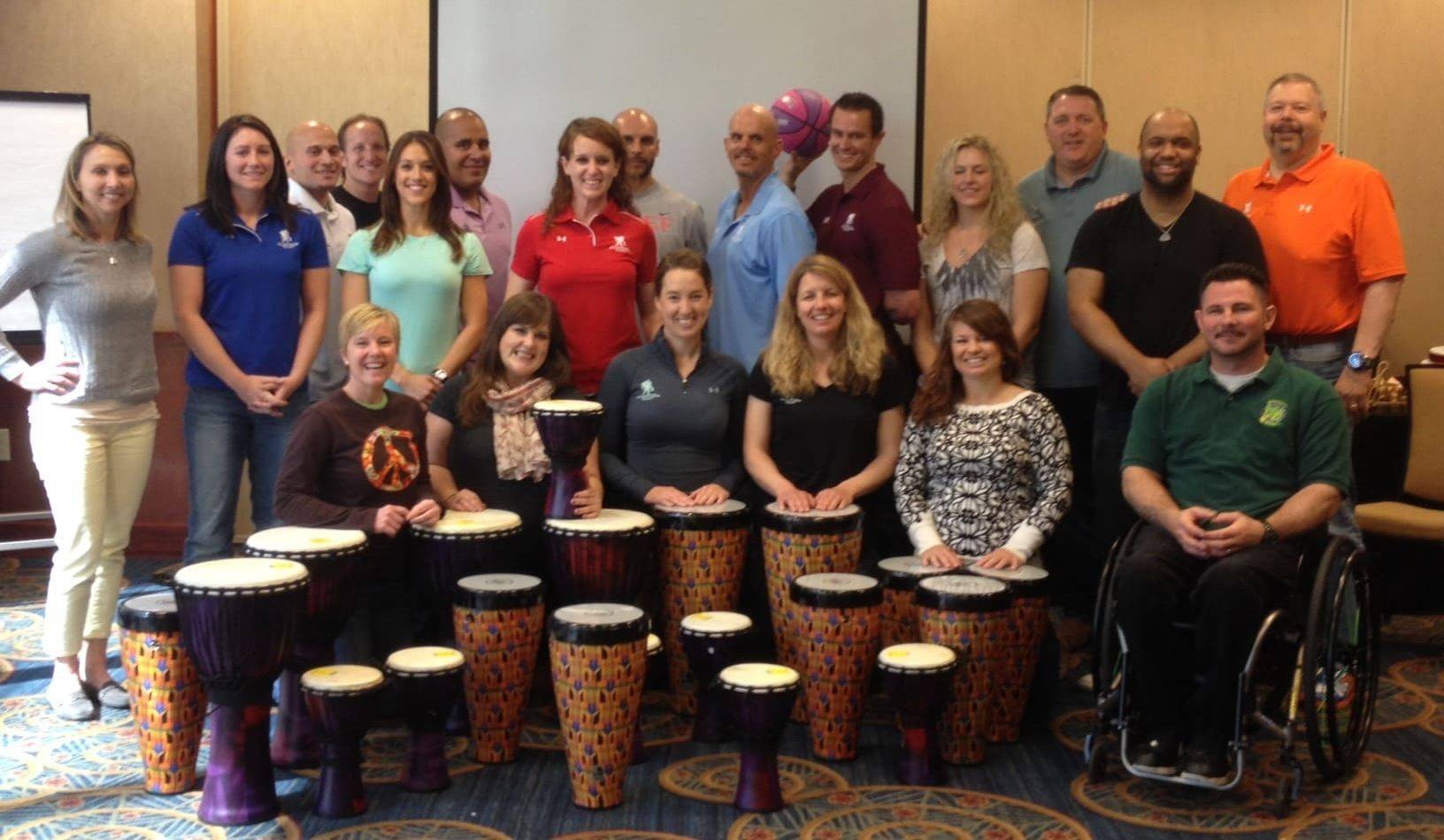 Mike Veny with the Wounded Warrior Project's Physical Health & Wellness Team following an interactive corporate drumming team-building workshop.