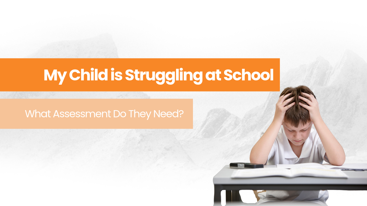 child sitting at desk with head in hands