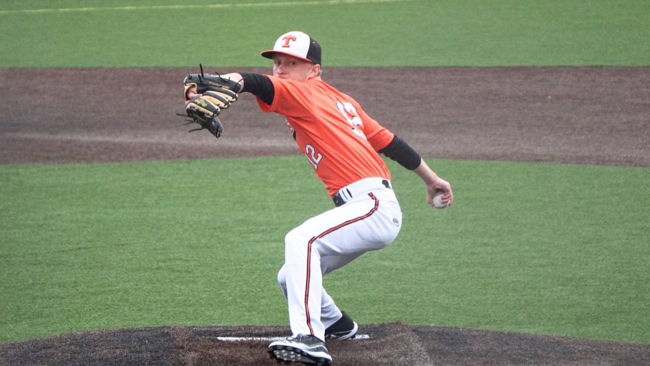 Youth baseball player pitching