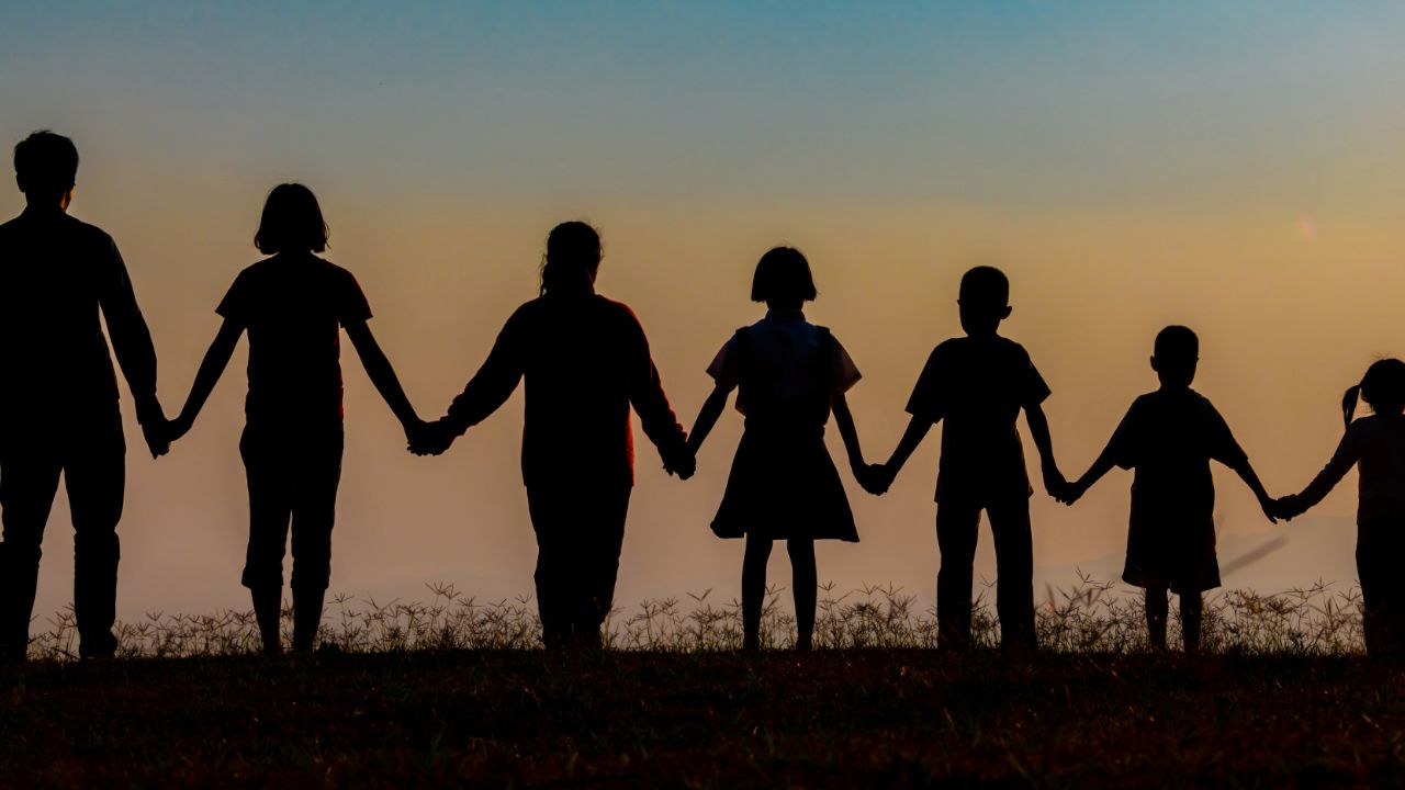ancestors and family holding hands happily after healing