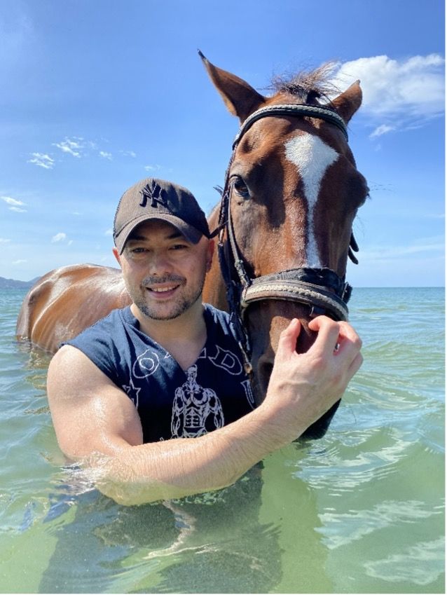 Paul Quinn with Horse in the Water