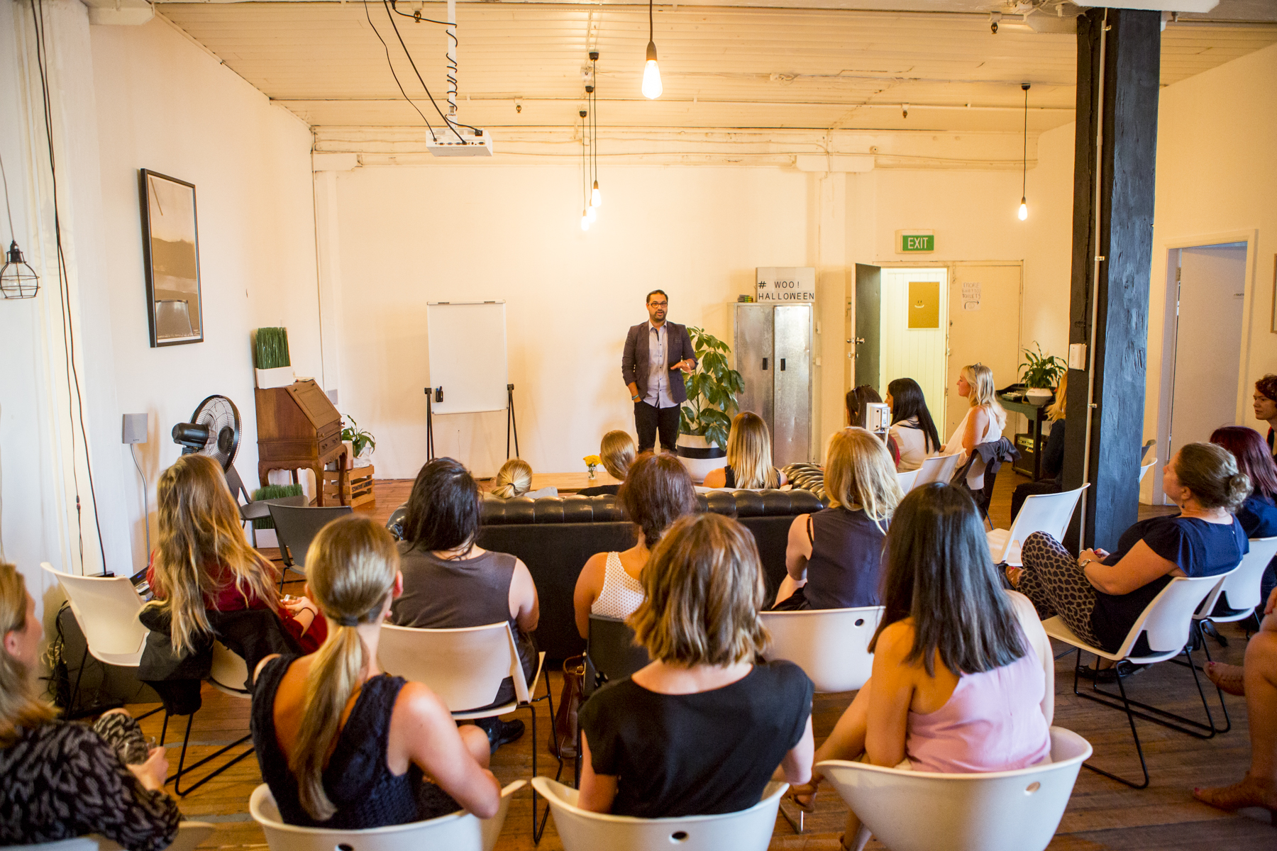 Russ coaching a room of women at a Social Collective workshop