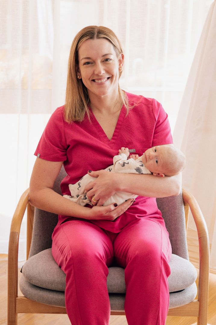 Parent and baby supported by Dr Kate