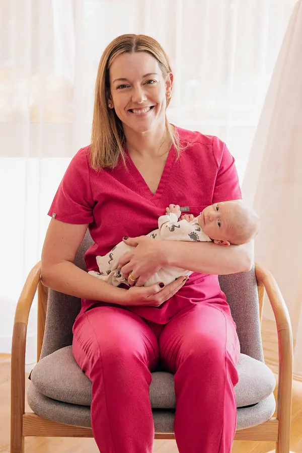 Parent and baby supported by Dr Kate