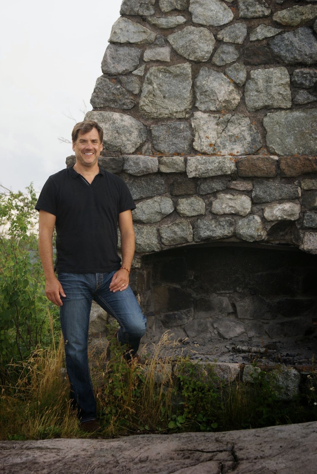 Dan at the Day Hill fireplace, which became the Tudor House fireplace