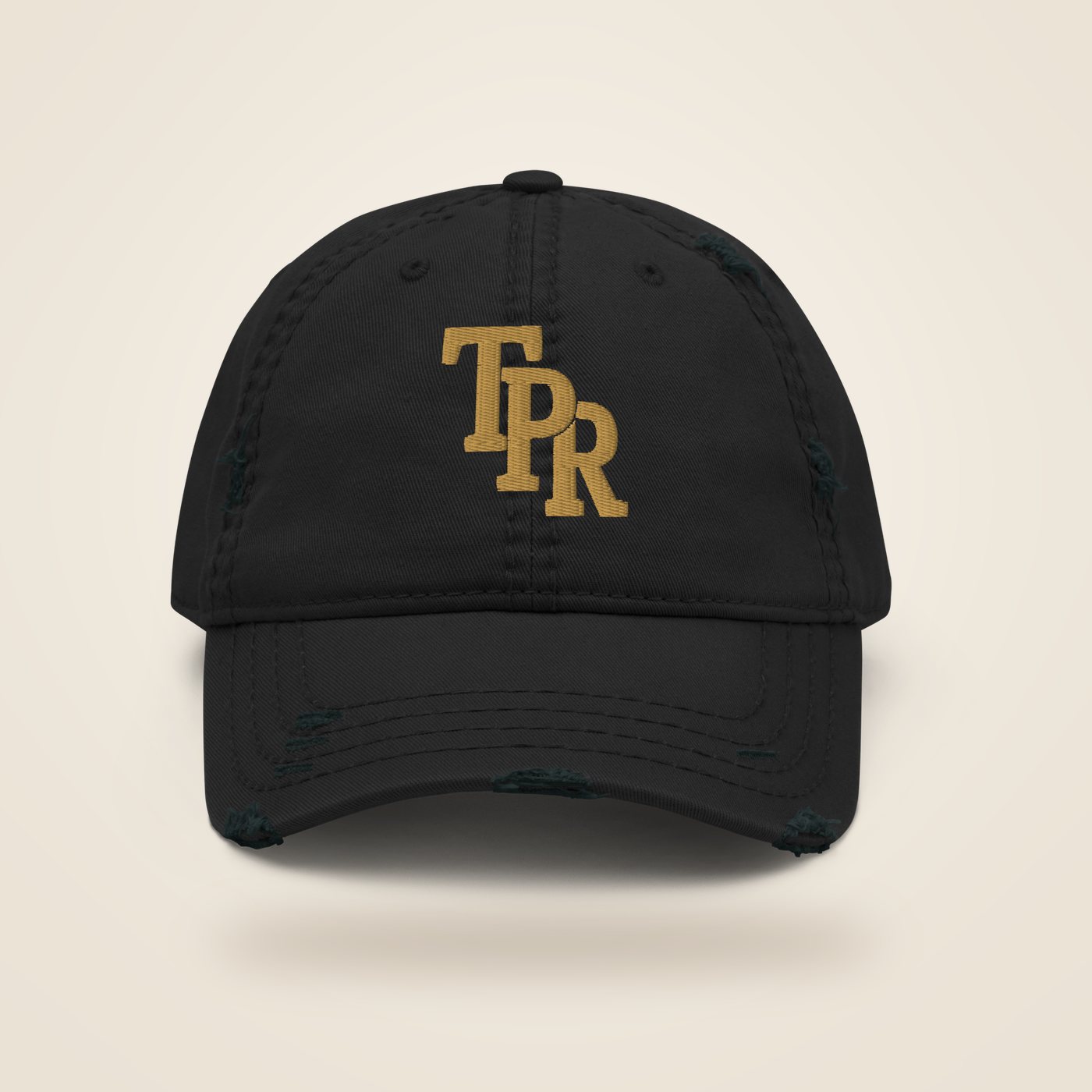 Black distressed dad hat with gold TPR embroidery