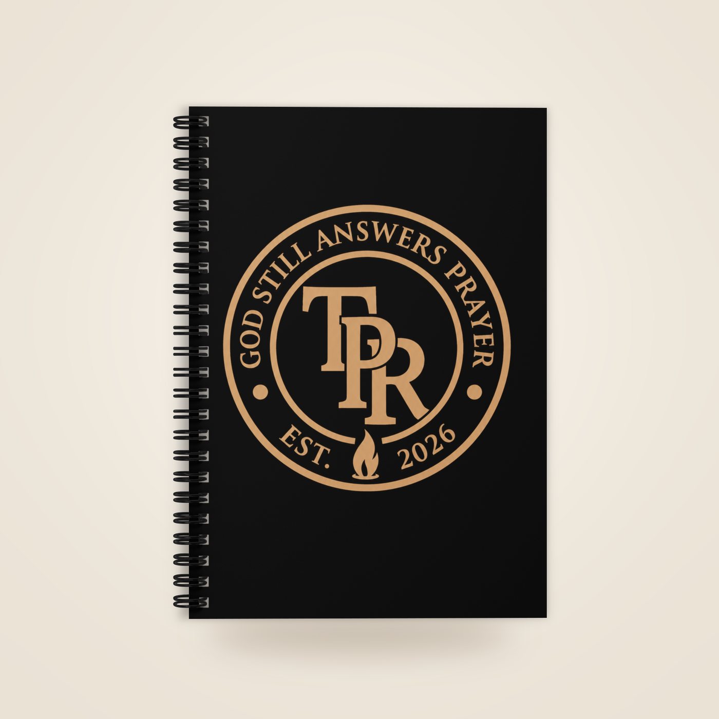 Black spiral notebook with gold TPR crest