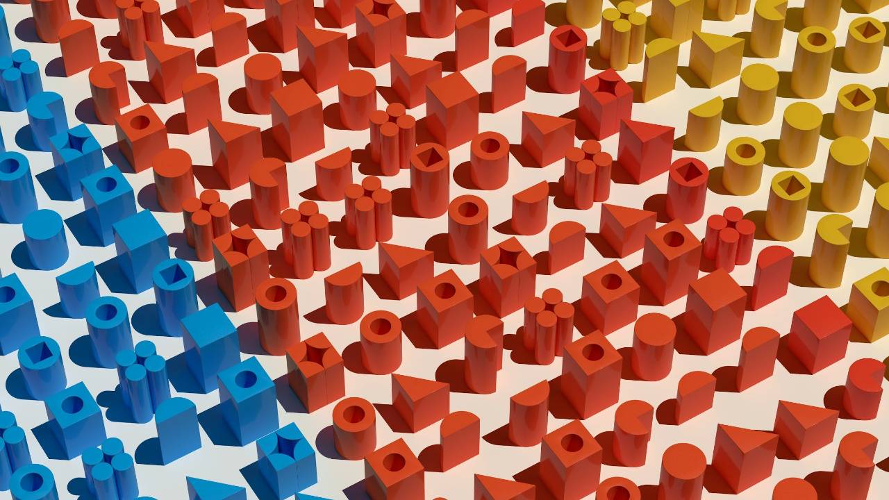 arrangement of blue, red and yellow pegs with circles and squares in the middle of each