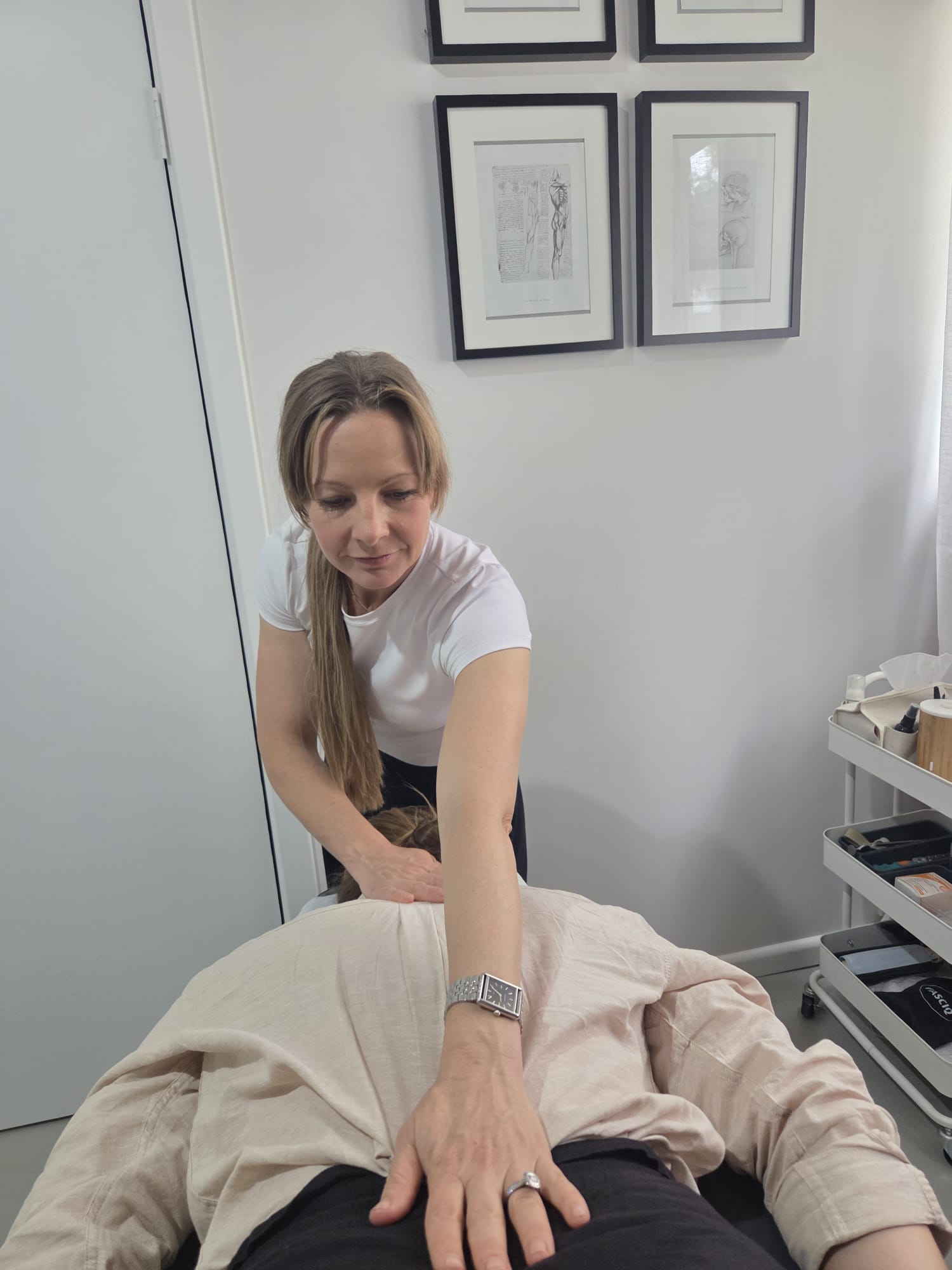 Nicola Wearne demonstrating hands-on soft tissue practice at Bio Health Therapies