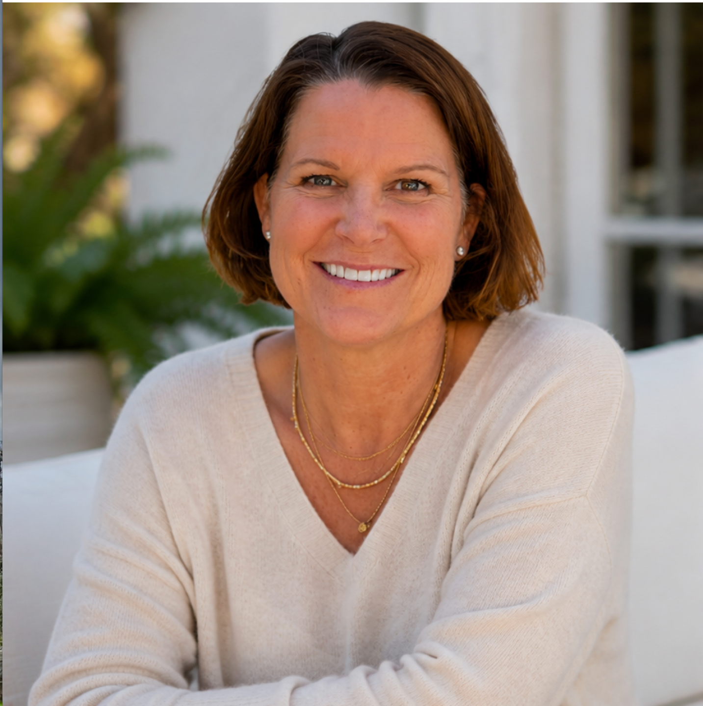 Lisa Reichenbach smiling with sweater