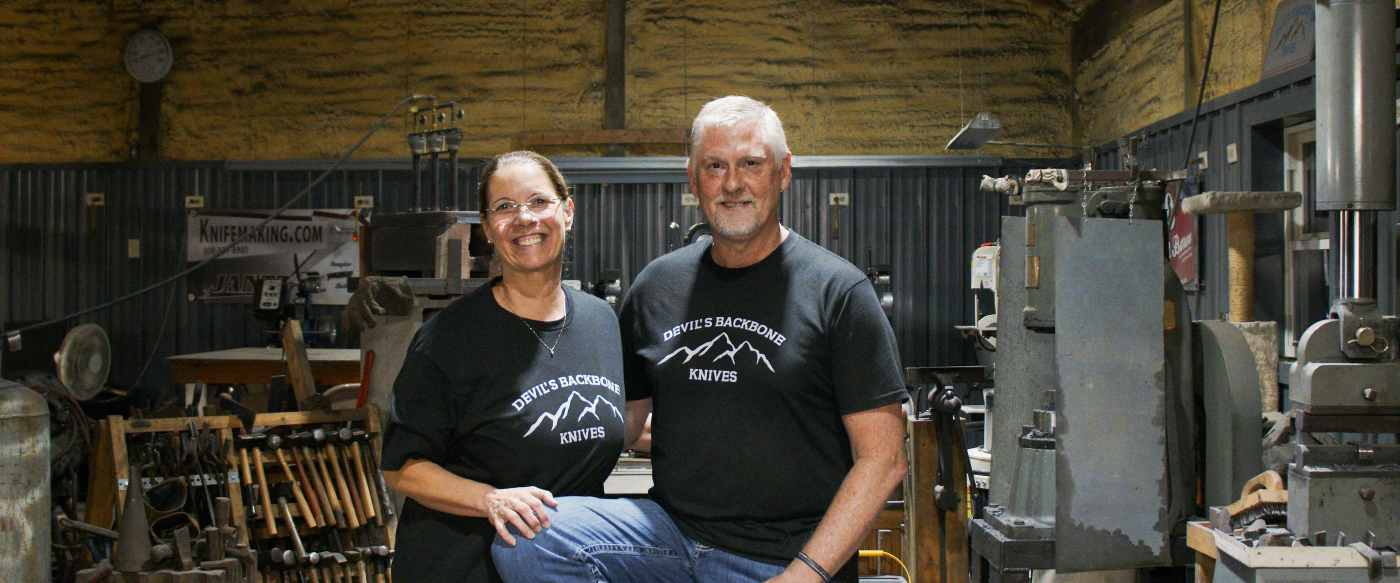 Bobby Walker and the Devil’s Backbone Knives team in the workshop.