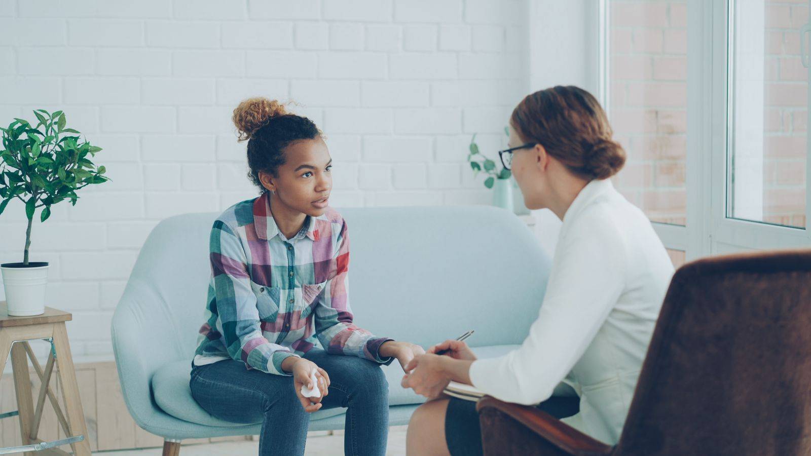 Caseworker talking with a young person