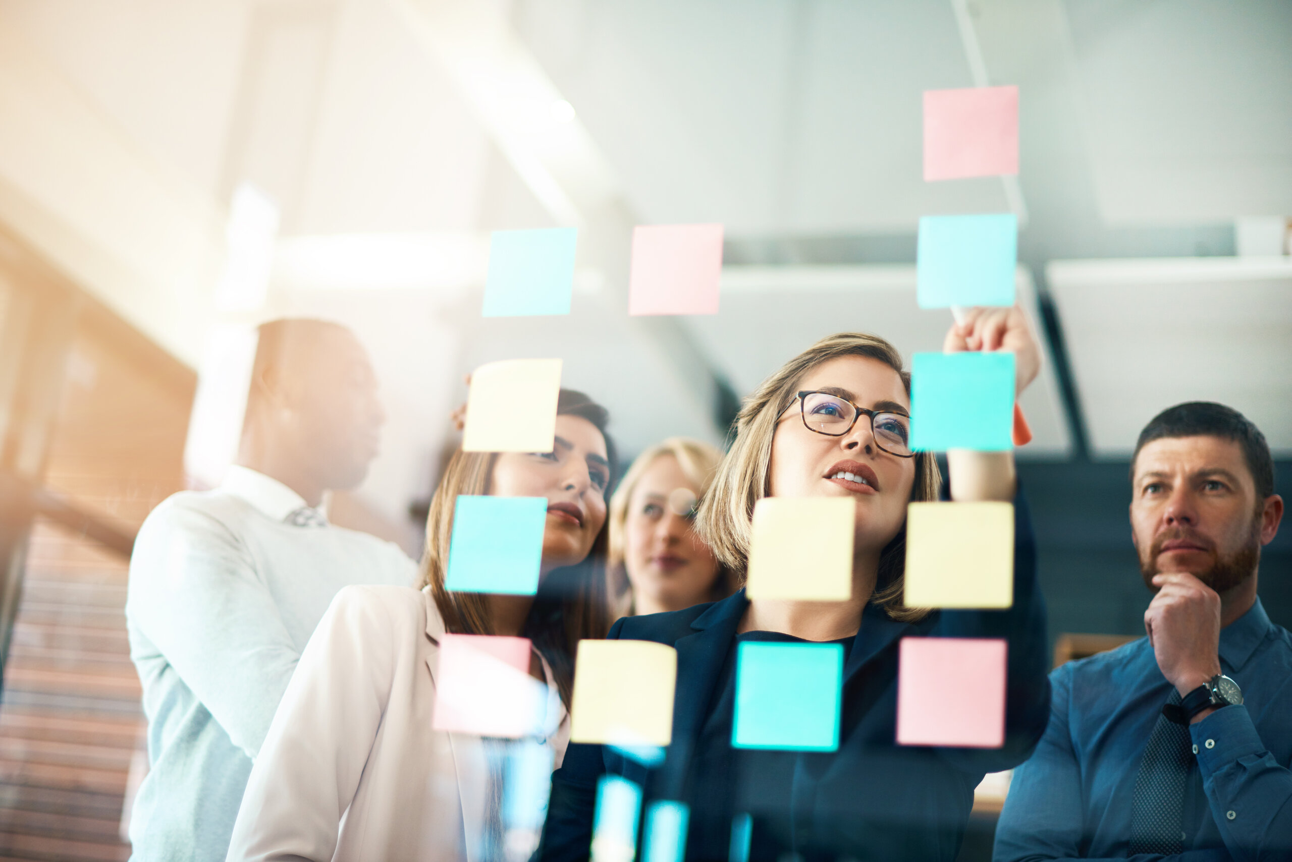 A leadership team working through a decision together