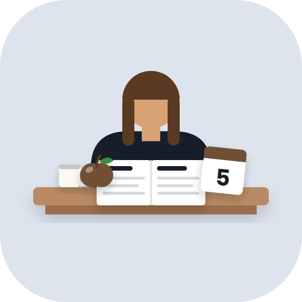 A teacher at a desk with an open plan book