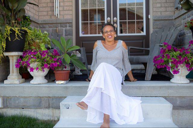 Natalie Stuart sitting on her front steps