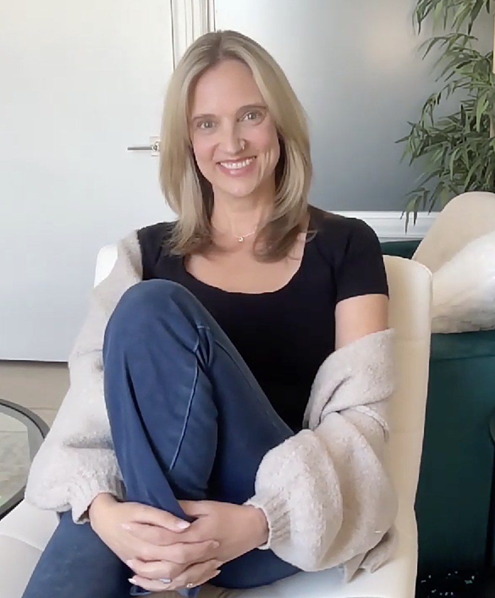 Ashley Jangro sitting in her office