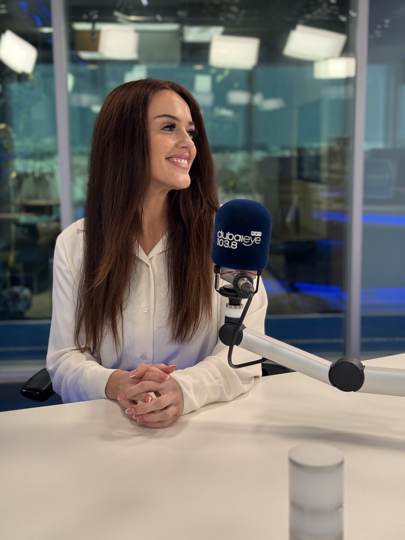 Natalie Walsh on air at Dubai Eye 103.8 for the Money Matters segment