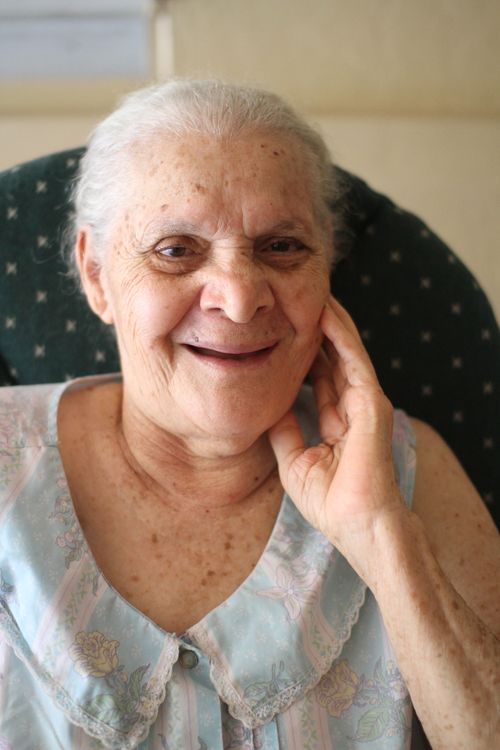 A grandmother smiling warmly
