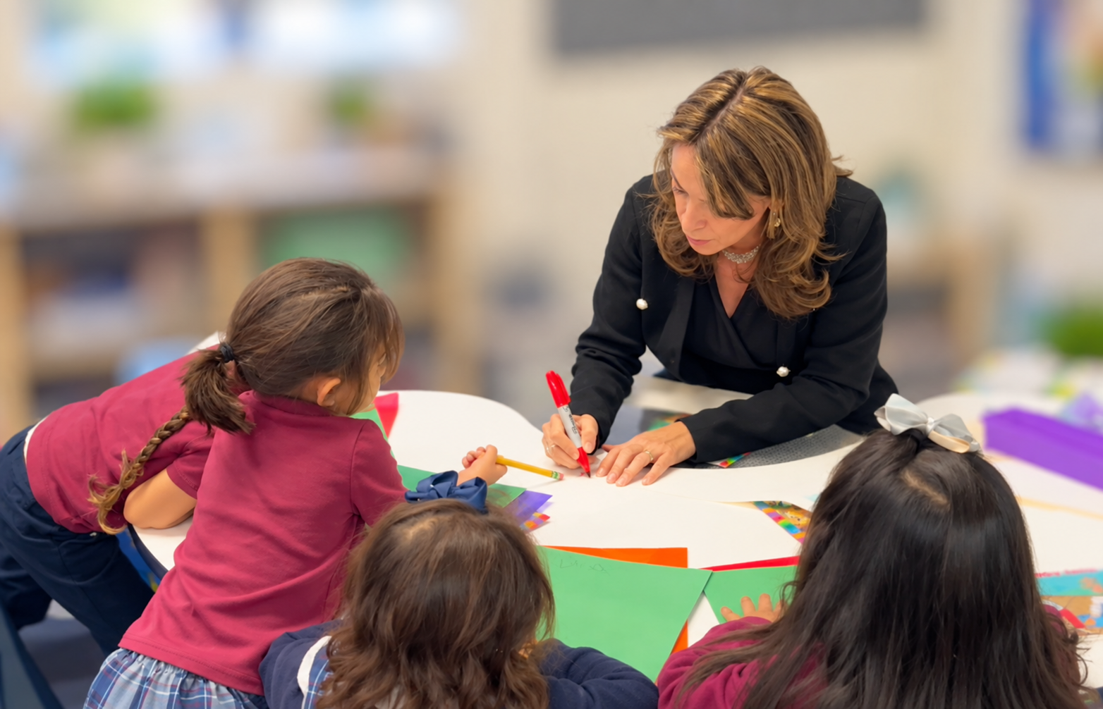 Teacher with students