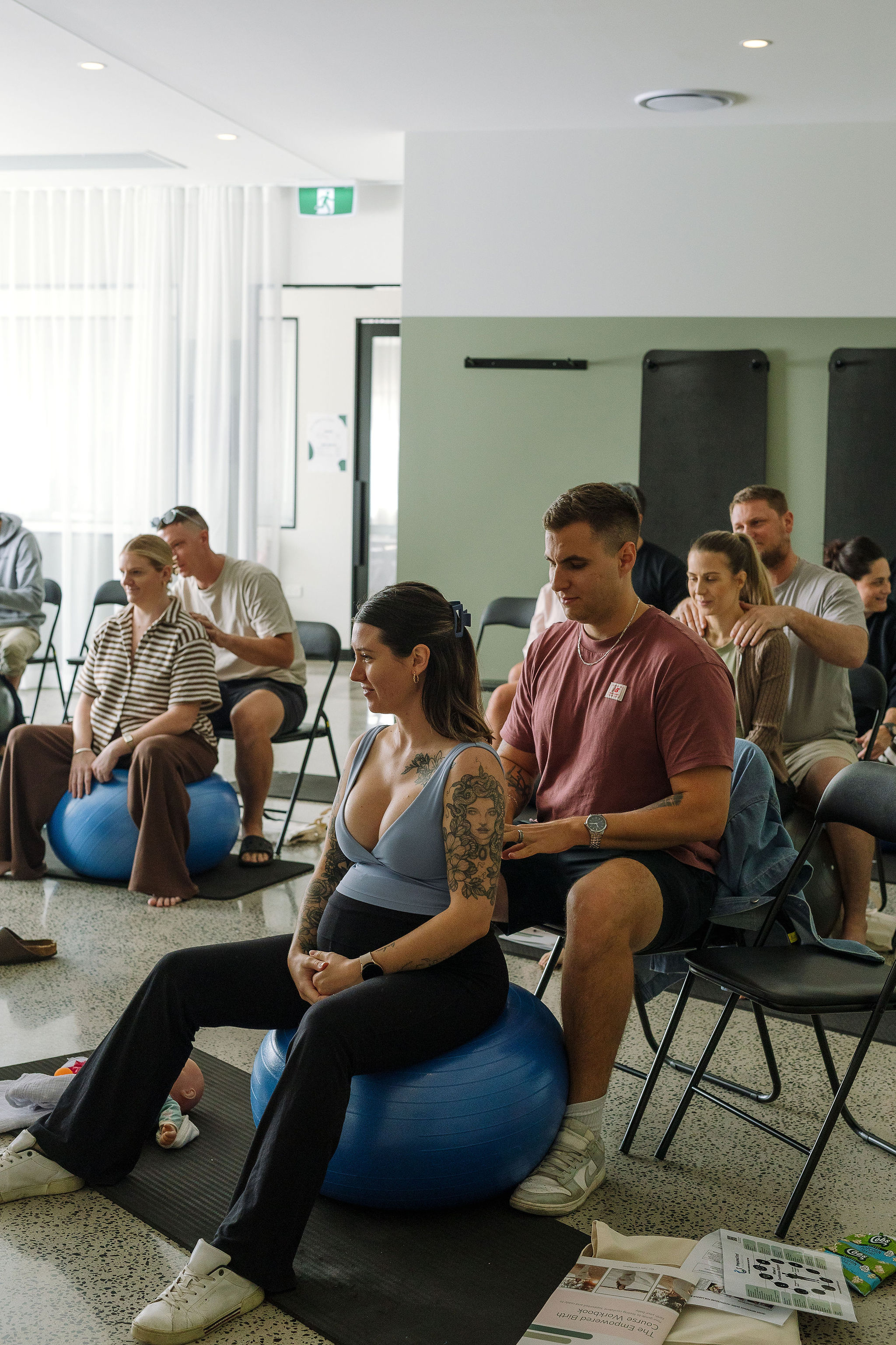 Couples attending an in-person Empowered Birth class