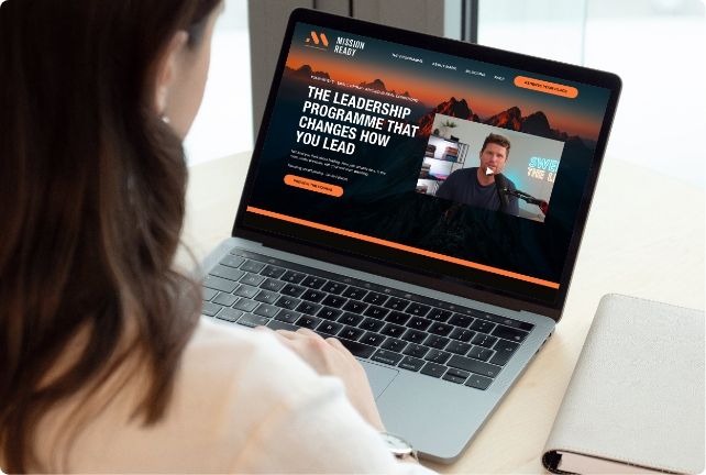 Lady looking at computer screen with Mission Ready Course
