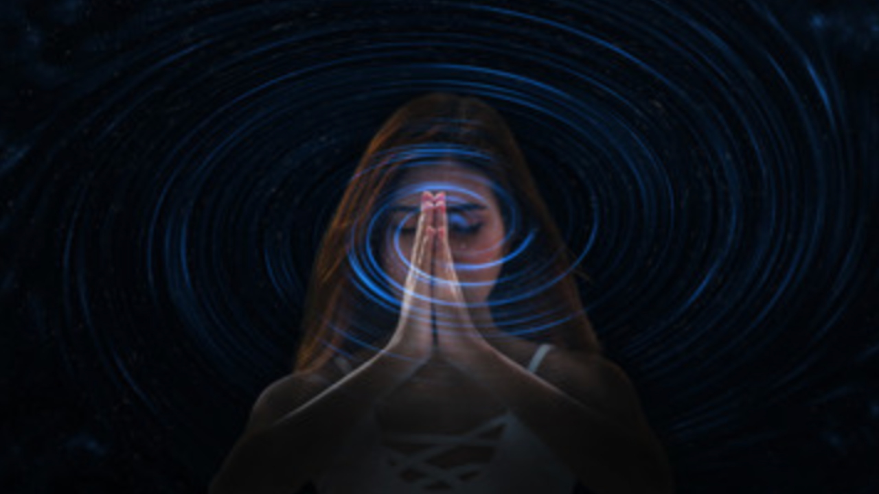 a woman in a forest performing a ritual/energy gesture, mystical and grounded rather than glossy, fits the "channeling"