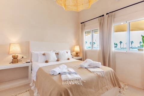 Bright double guest room with fresh linens