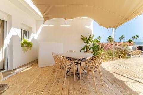 Pool and Mediterranean garden overlooking the sea
