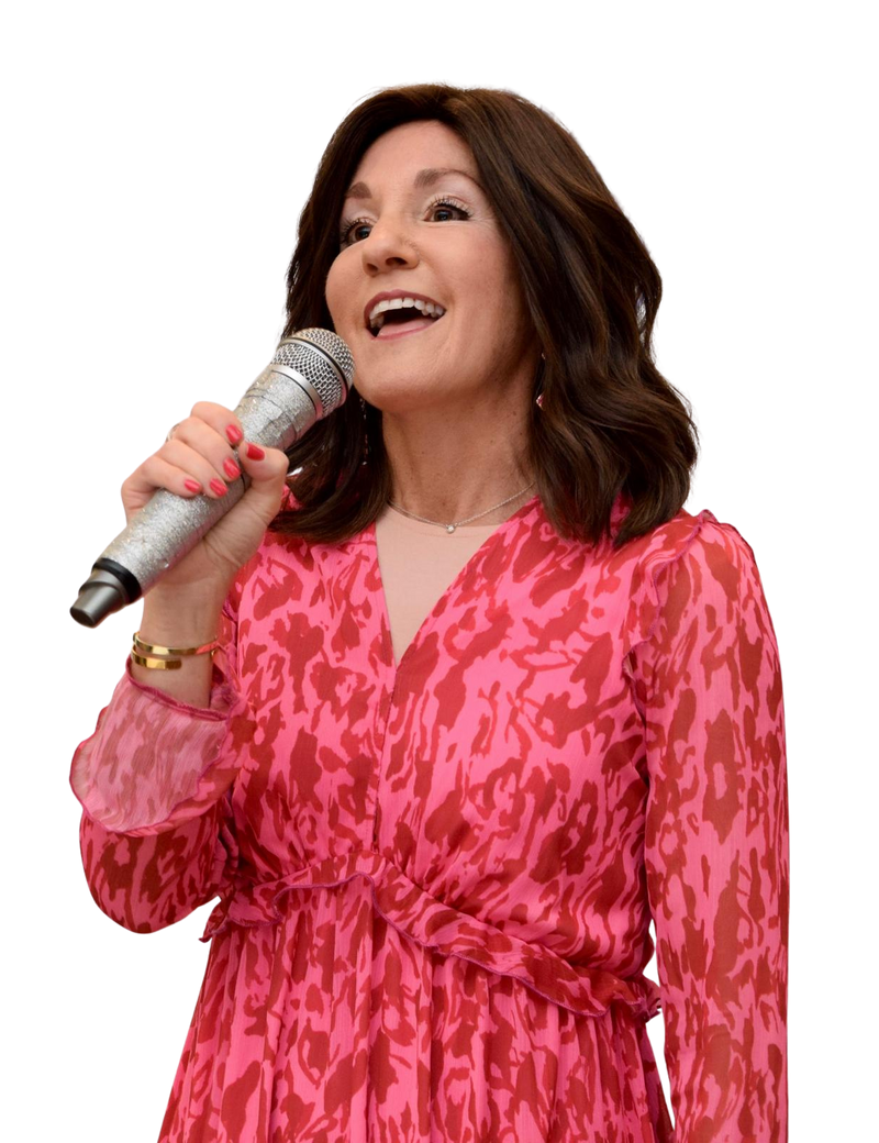 Devorah Kigel holding a microphone