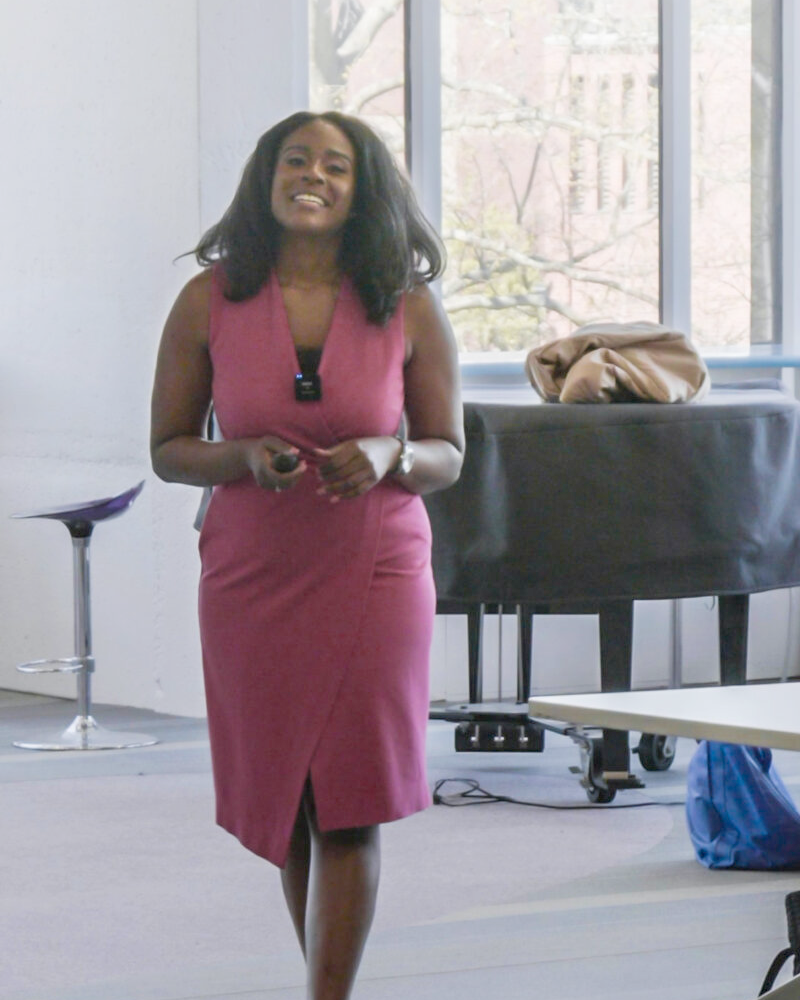 Latoya C. Watson presenting to an audience in a classroom