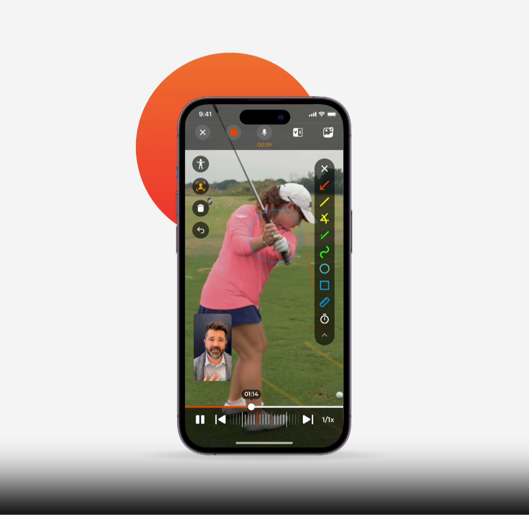 Coach reviewing a swing video