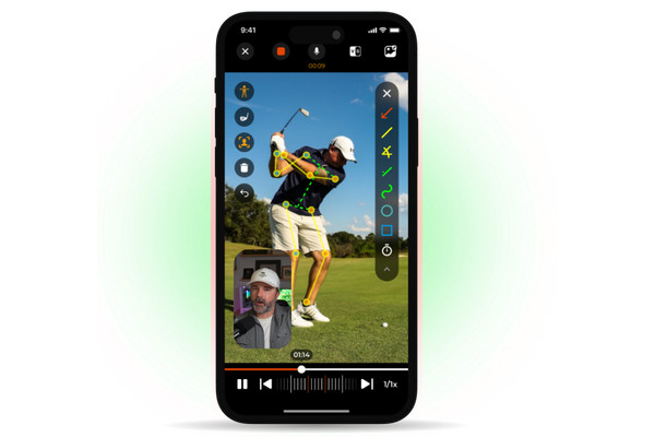 Coach reviewing a swing video