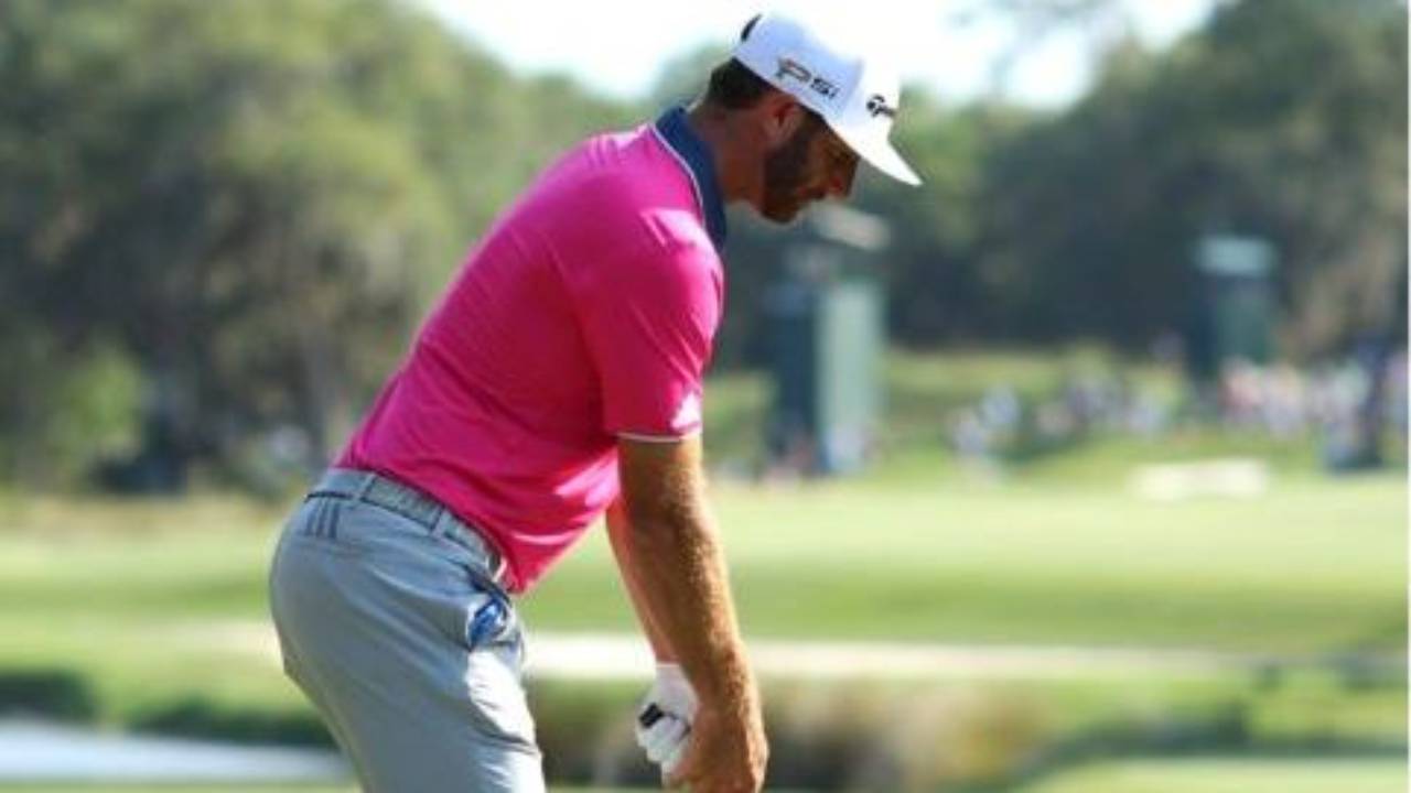 Dustin Johnson at driver address showing distance from the ball