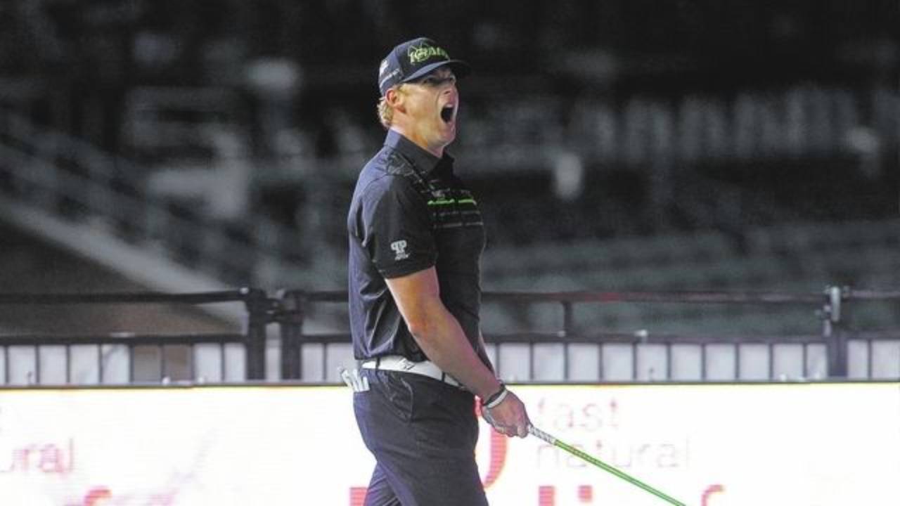 Tim Burke celebrating a long drive swing