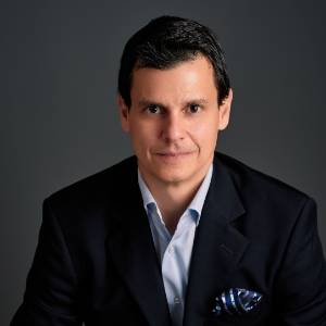 Portrait of César Gamio, author of Leading in the Modern World