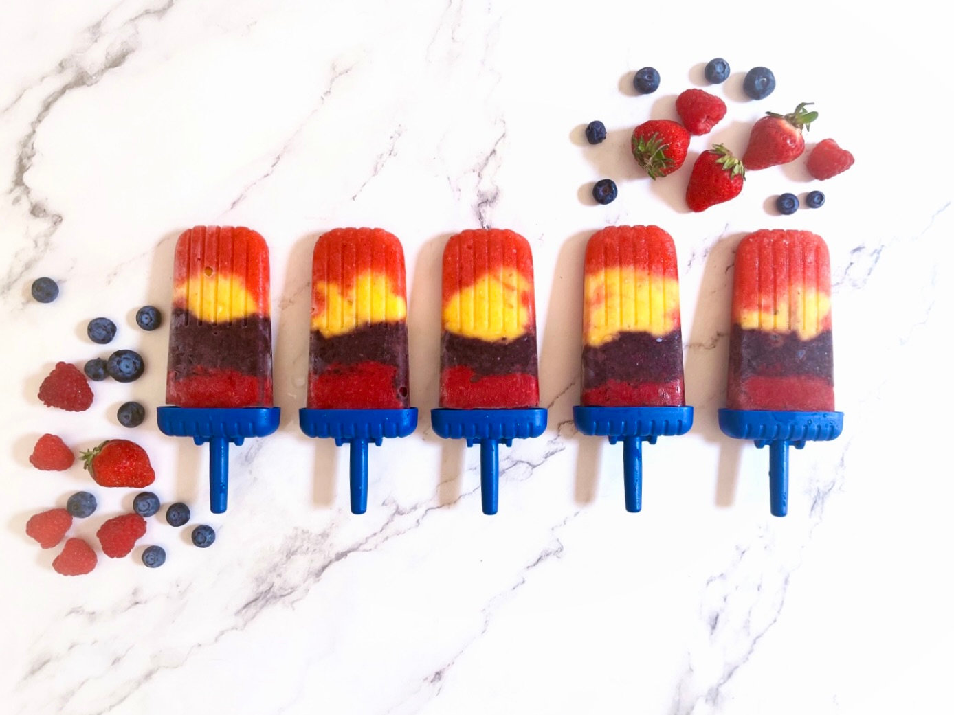 Bentley's Summer Berry Mango Protein Popsicles: A Refreshing Treat for an Active Mind!