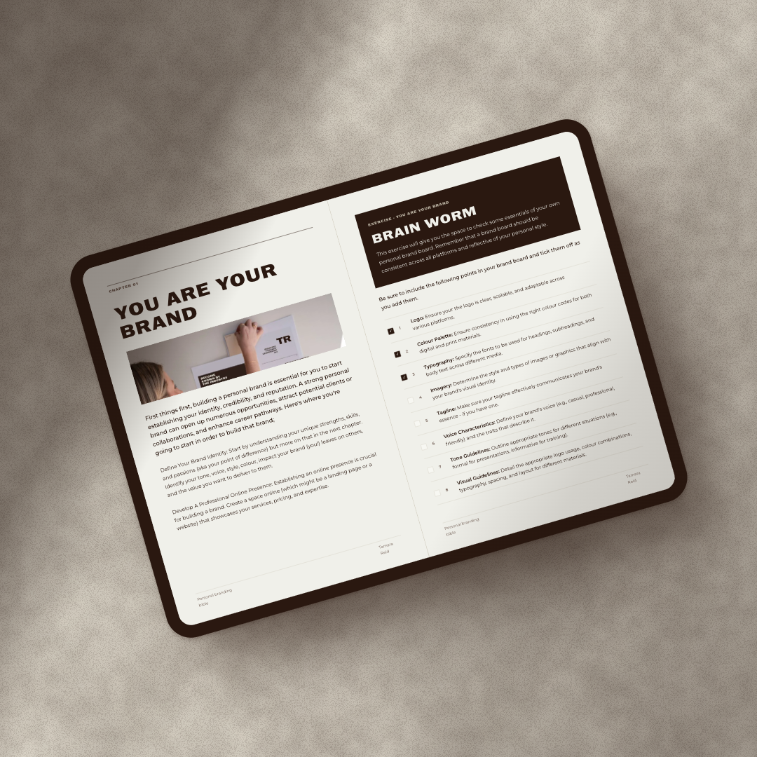 The Personal Branding Bible open on a tablet at a Brain Worm exercise