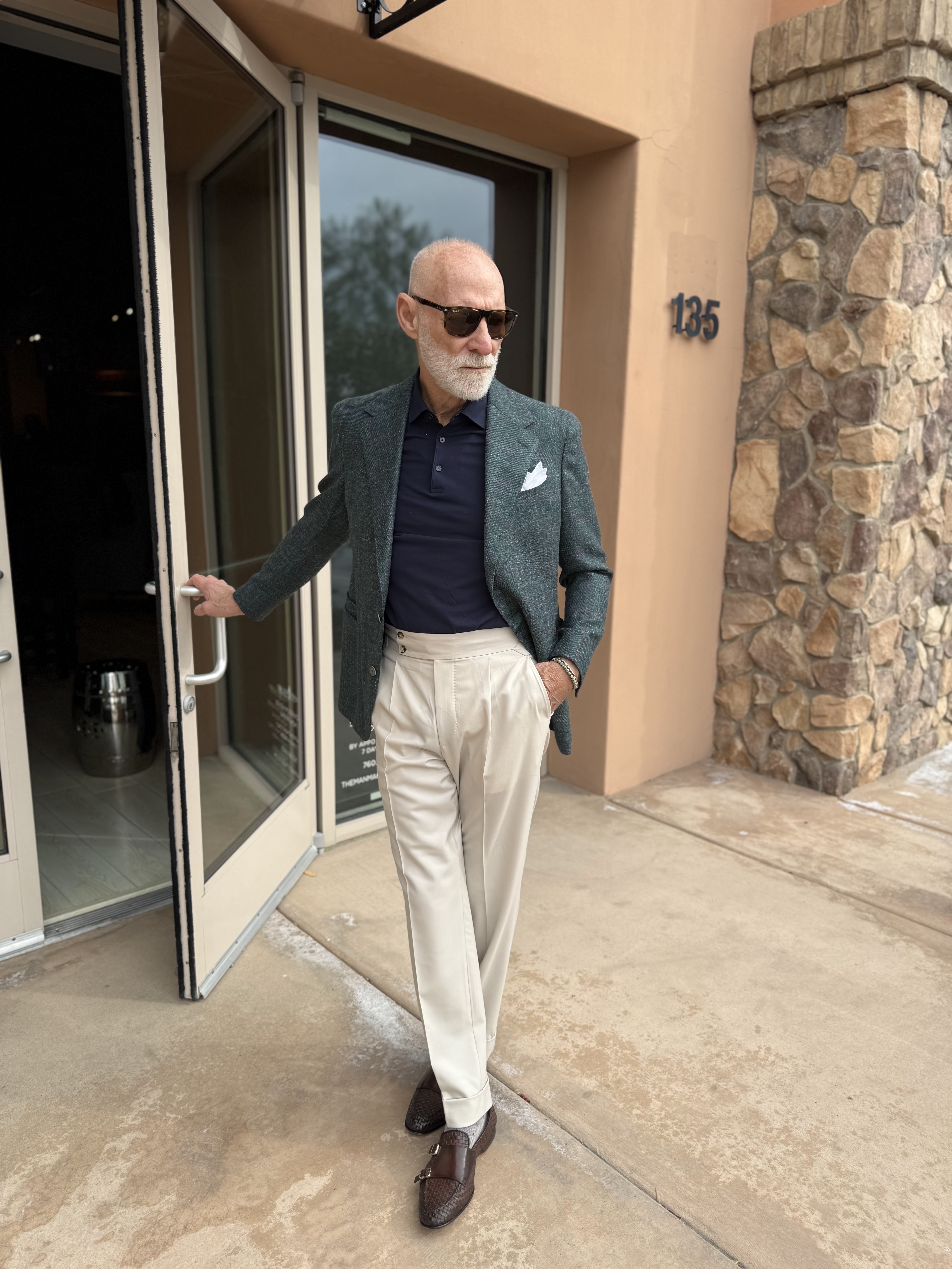 Randy Willard, Fortune 500 stylist, in a grey double-breasted suit