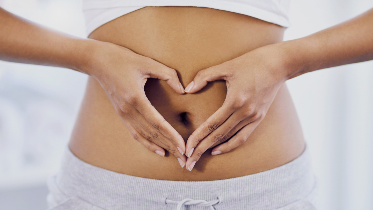 making a heart over stomach