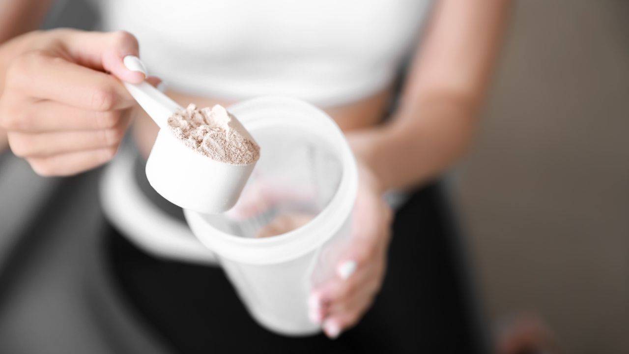 Woman preparing a protein-rich yogurt snack